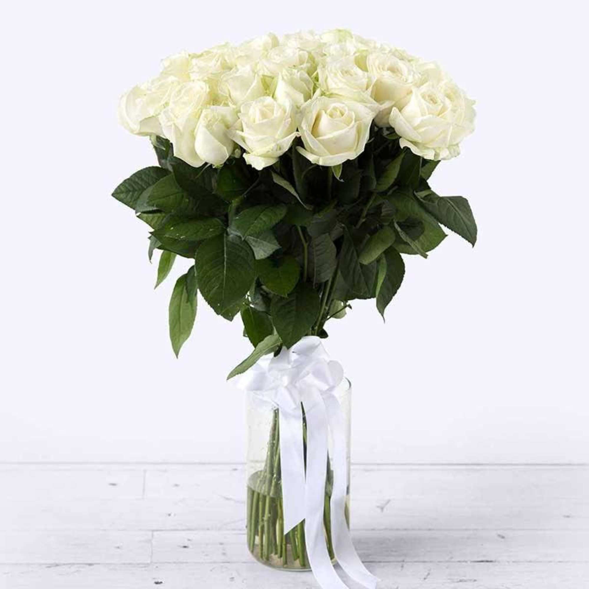25 Long Stem white roses in a vase