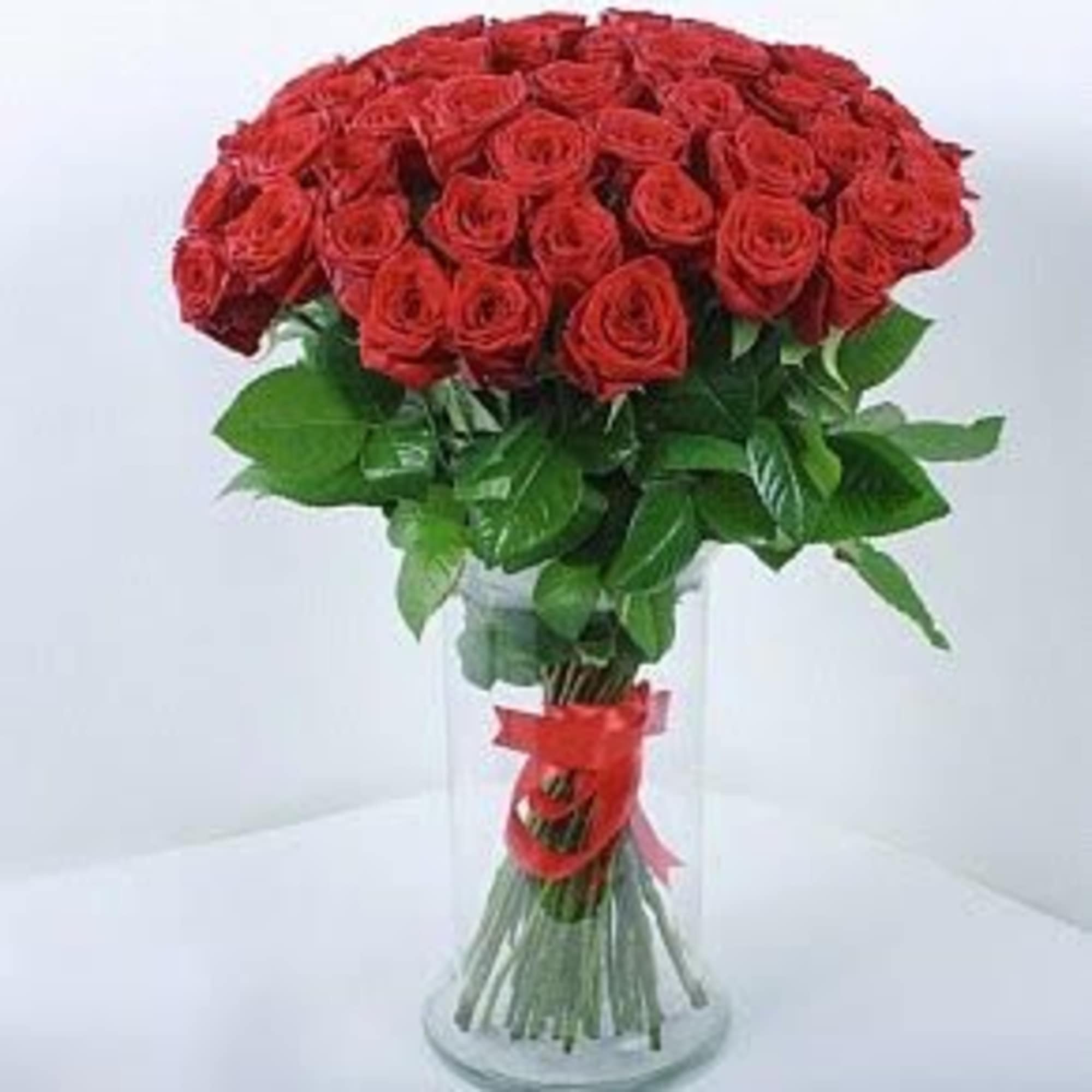 25 Premium Long Stem roses in a vase